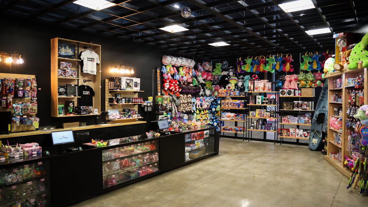 Redemption prize room with plush wall and prize counters